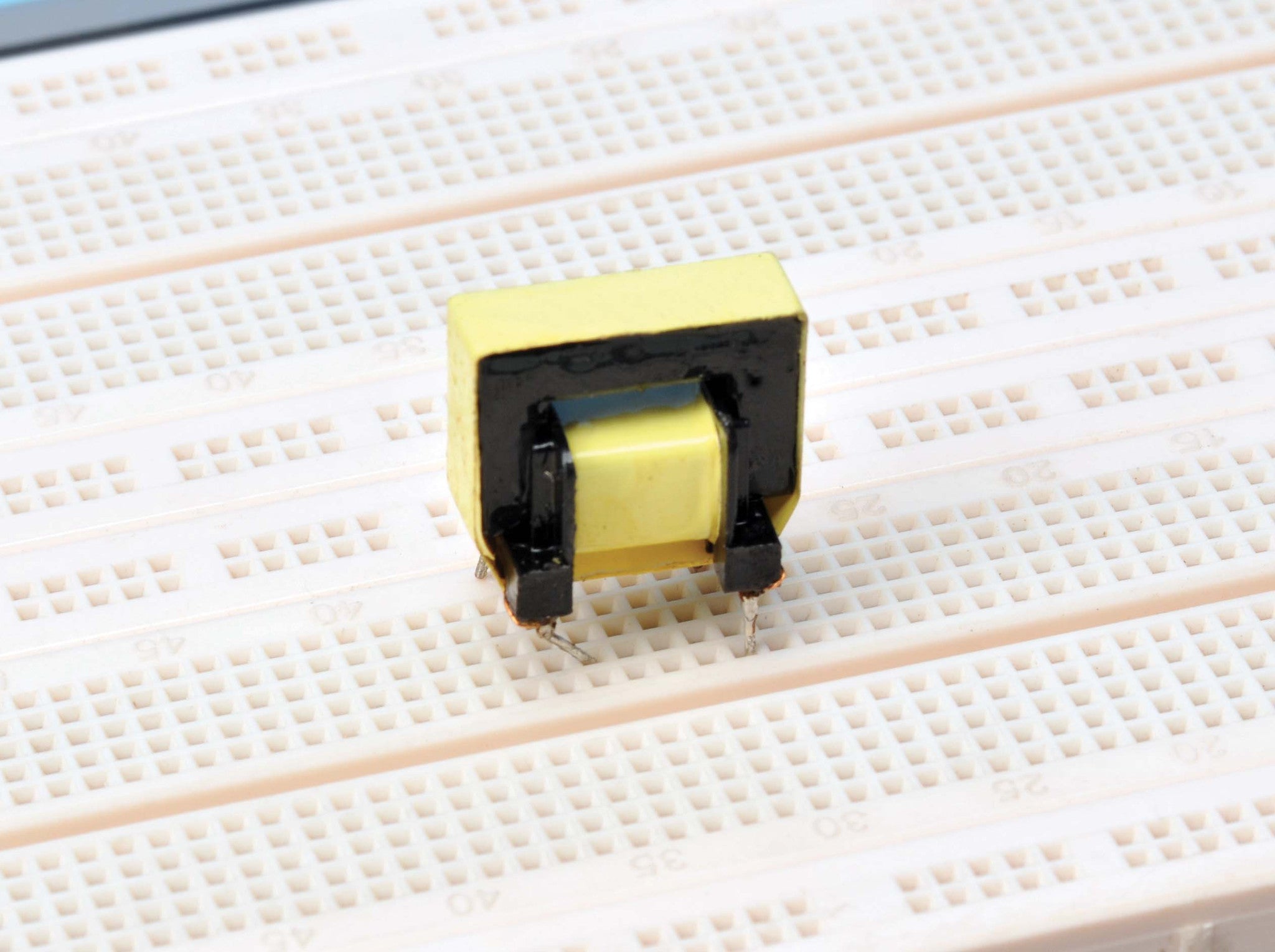 Through-Hole Inductor for Physics Experiments